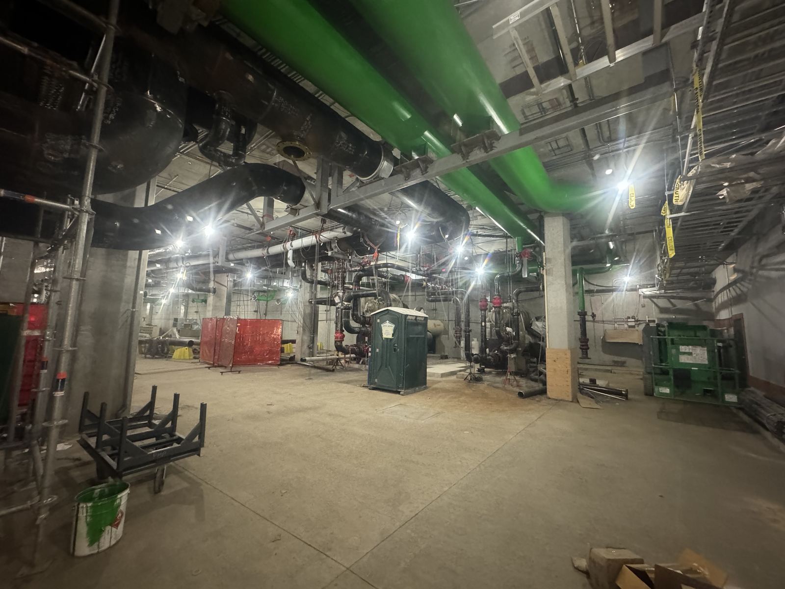 Wide view of underground pipe network and work area