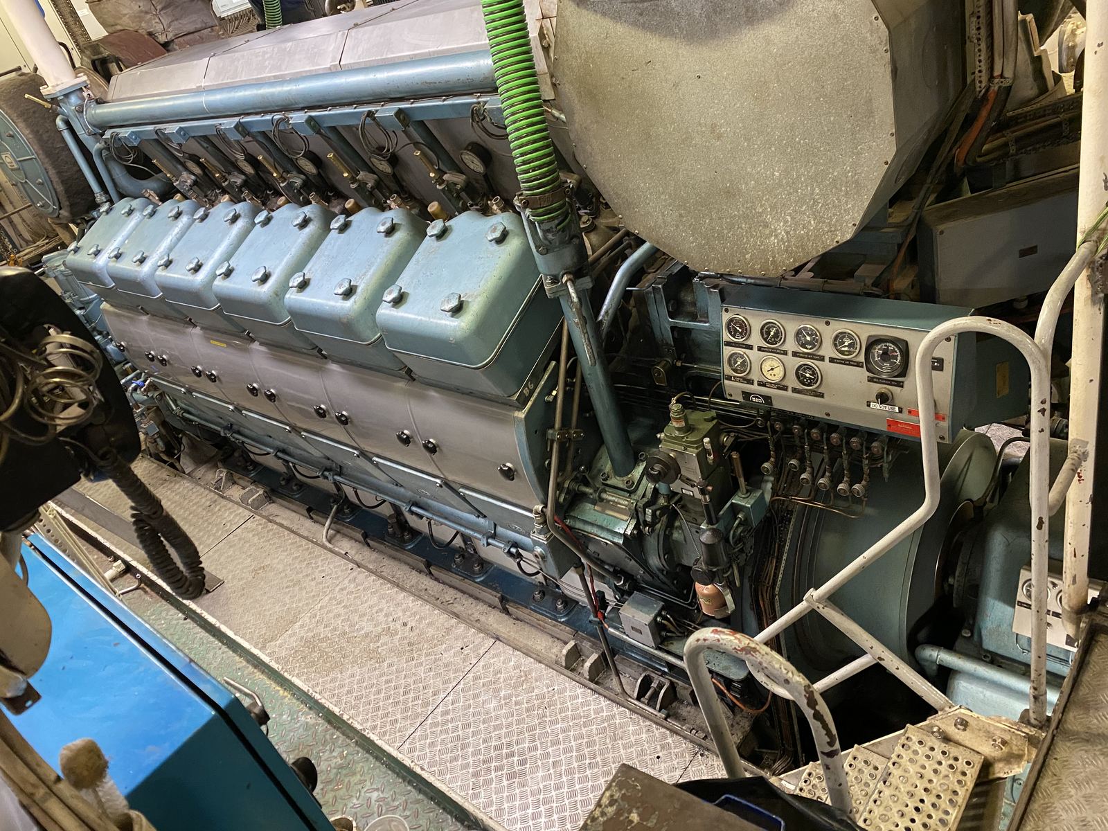 Main diesel engine in a commercial fishing vessel's engine room